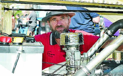 Stanthorpe’s Ron Wilson looks inside his 1937 Ford Pickup. Stanthorpe’s Ron Wilson looks inside his 1937 Ford Pickup.